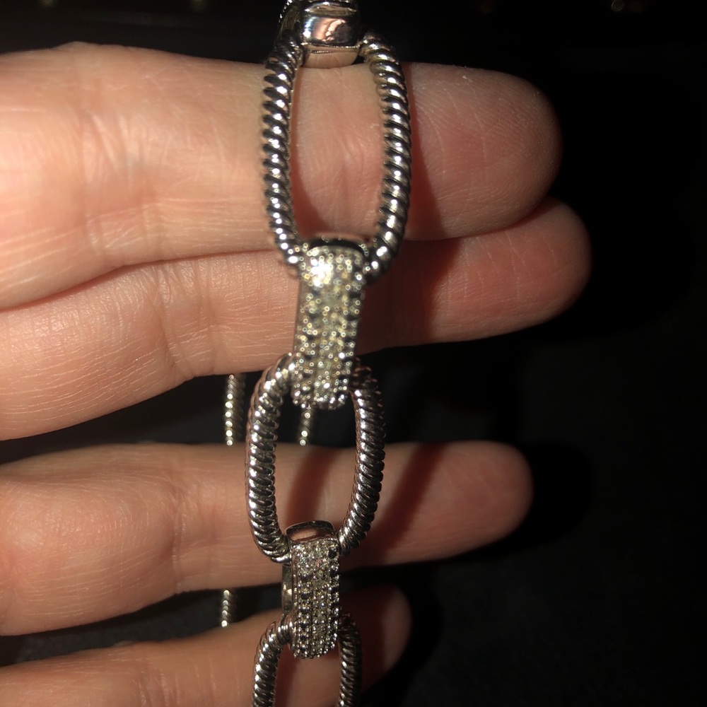 Diamond and sterling silver link bracelet.